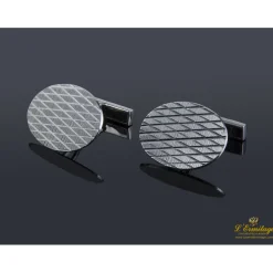 GEMELOS Gemelos realizados en oro blanco en forma oval con  grabado a rombos.