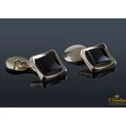 GEMELOS Gemelos realizados en oro amarillo y motivos con onix