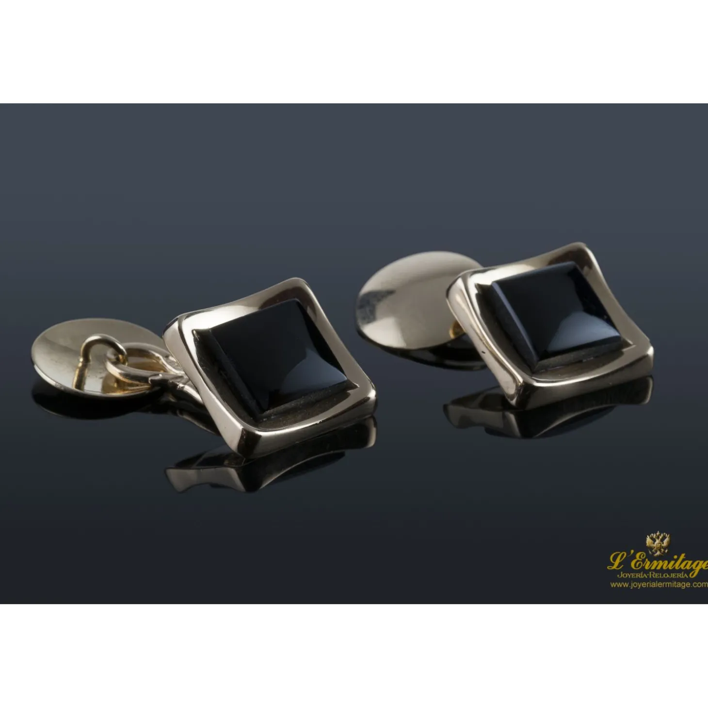 GEMELOS Gemelos realizados en oro amarillo y motivos con onix