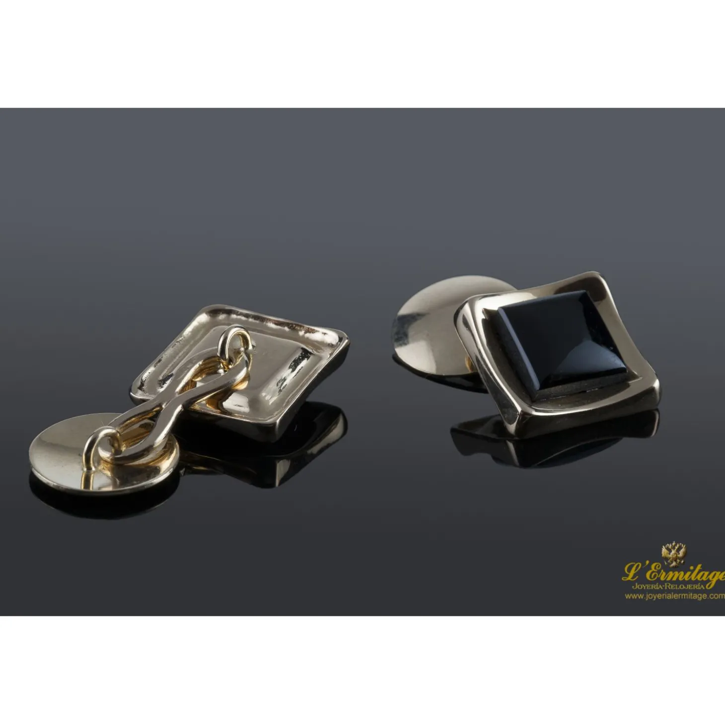 GEMELOS Gemelos realizados en oro amarillo y motivos con onix