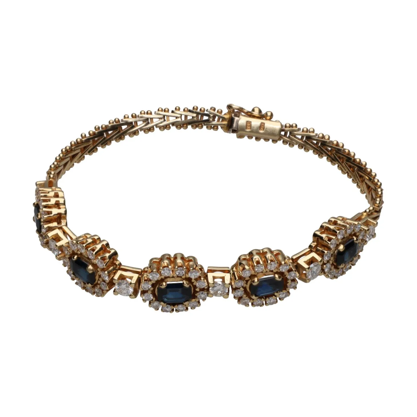GEMELOS Pulsera en oro amarillo de 14k con zafiros y brillantes.