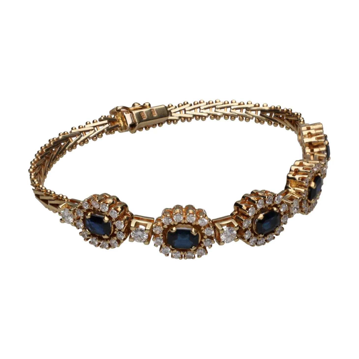 GEMELOS Pulsera en oro amarillo de 14k con zafiros y brillantes.