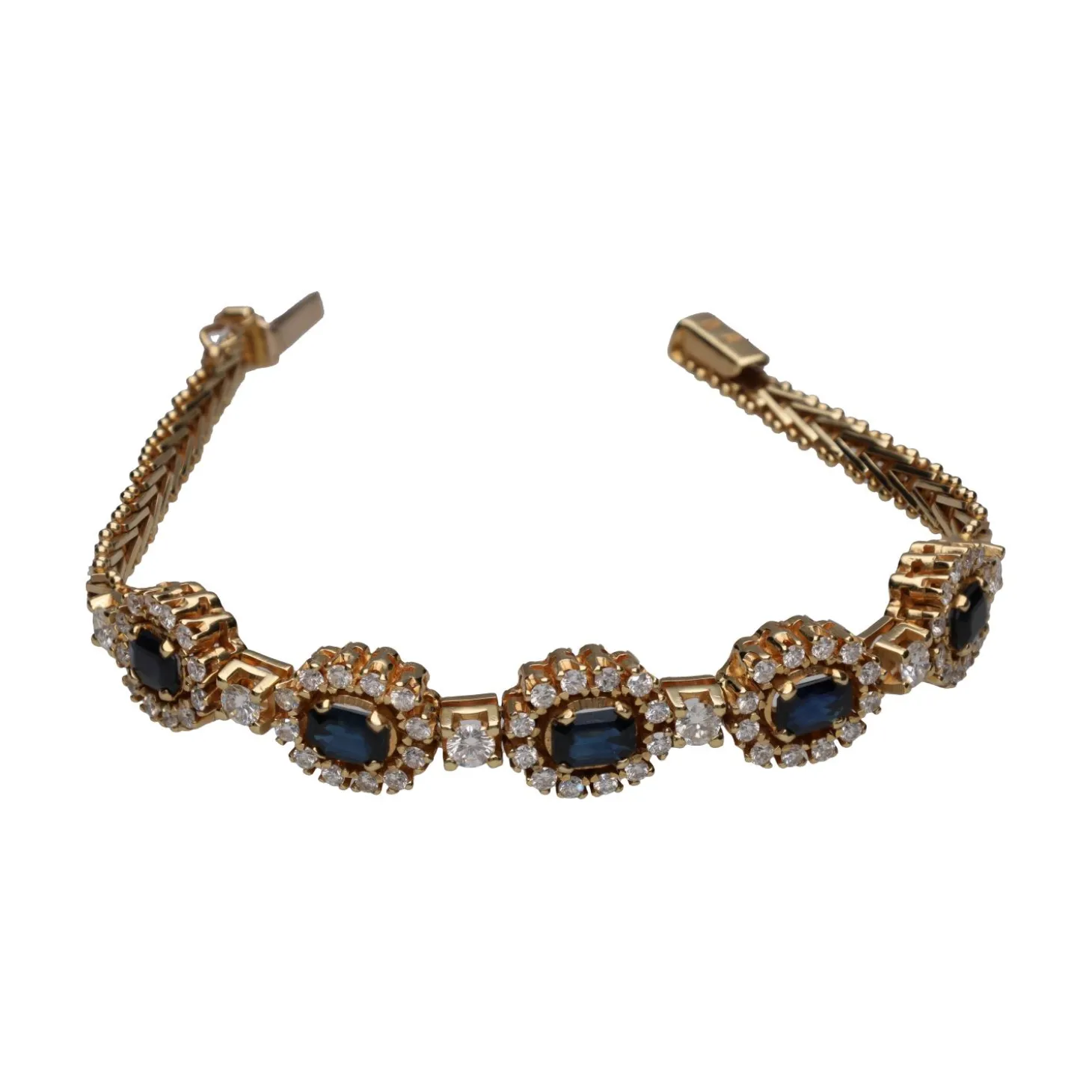 GEMELOS Pulsera en oro amarillo de 14k con zafiros y brillantes.