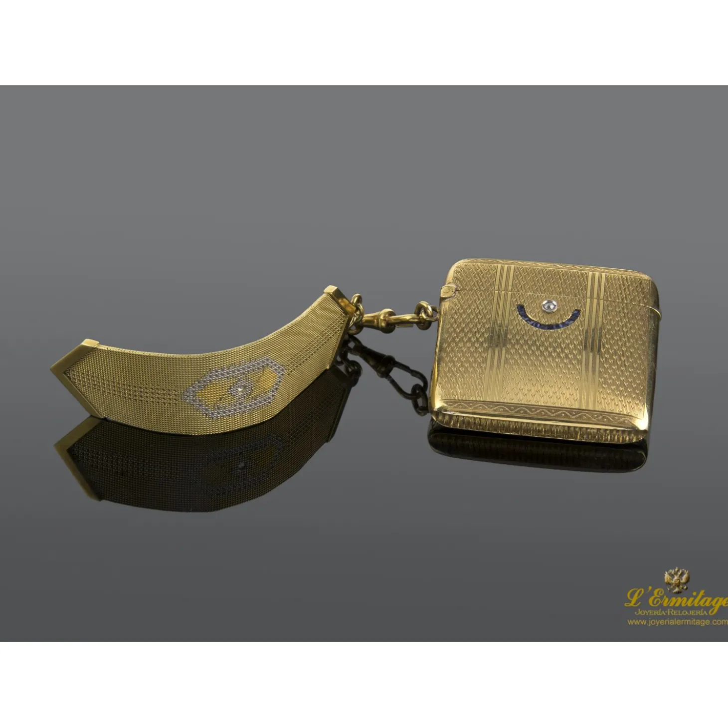 OTROS Cerillero antiguo oro amarillo zafiros y diamantes.