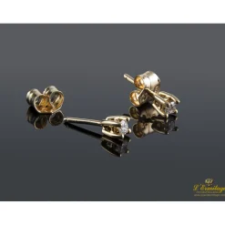 PENDIENTES Dependientes realizados en oro amarillo con brillantes.