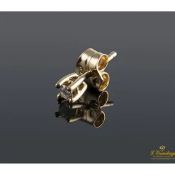 PENDIENTES Dependientes realizados en oro amarillo con brillantes.