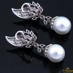PENDIENTES Pendiente colgantes oro blanco zafiros diamantes y perlas australianas.
