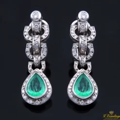 PENDIENTES Pendientes colgantes oro blanco esmeraldas y diamantes.