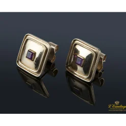 PENDIENTES Pendientes cuadrados realizados en oro amarillo y engaste de dos rubíes.