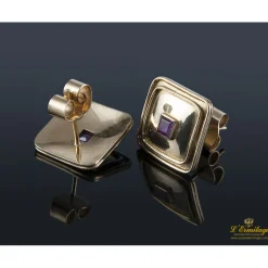 PENDIENTES Pendientes cuadrados realizados en oro amarillo y engaste de dos rubíes.