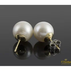 PENDIENTES Pendientes dormilonas de perlas montadas en oro amarillo.