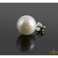 PENDIENTES Pendientes dormilonas de perlas montadas en oro amarillo.