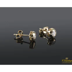 PENDIENTES Pendientes dormilonas oro amarillo y diamantes.