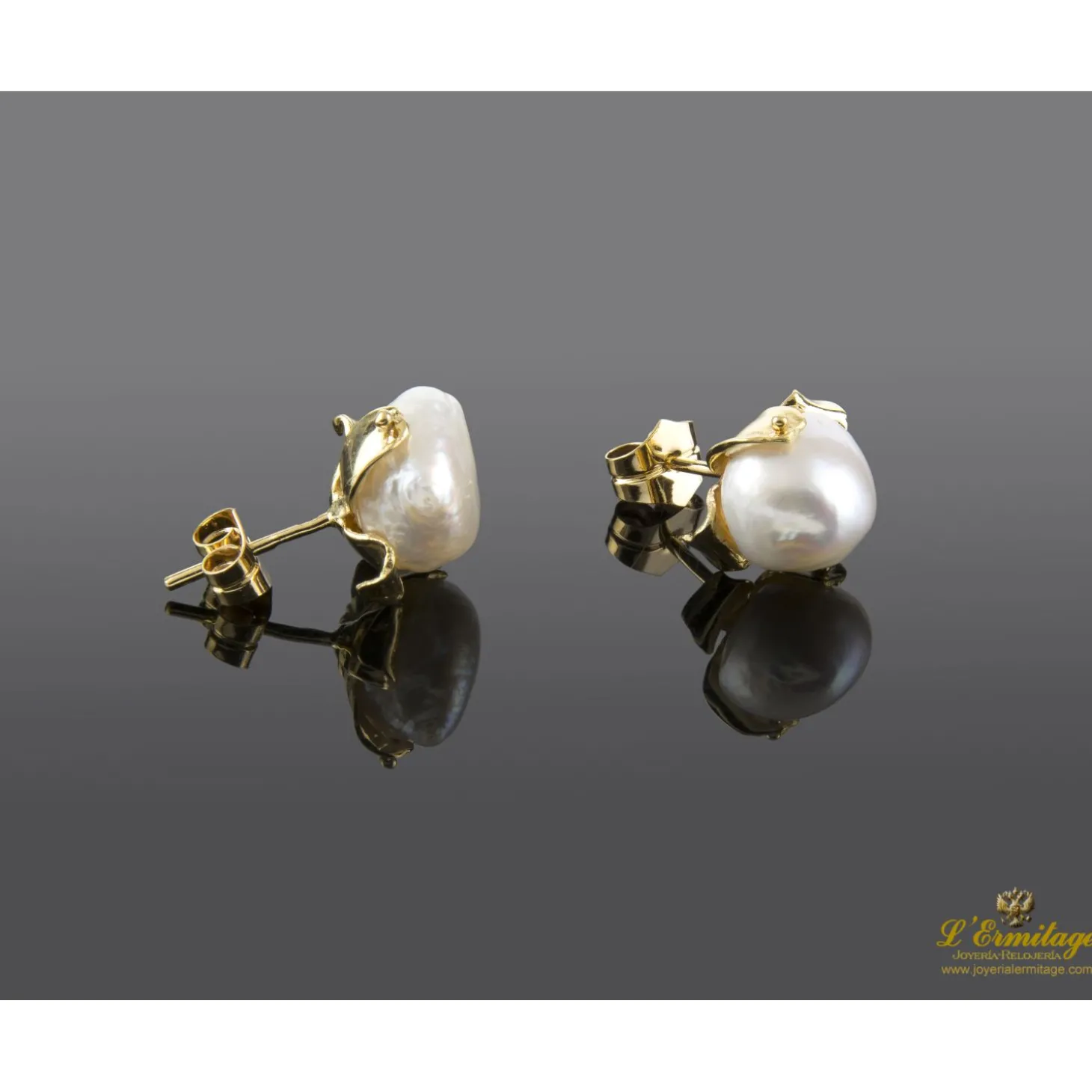 PENDIENTES Pendientes en oro amarillo y perlas barrocas