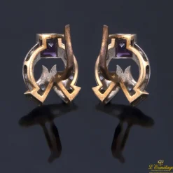 PENDIENTES Pendientes en oro amarillo y oro blanco con amatistas y circonitas.