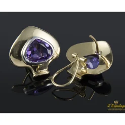PENDIENTES Pendientes en oro amarillo y oro blanco con amatistas.