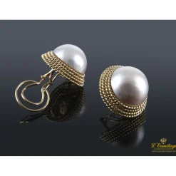 PENDIENTES Pendientes oro amarillo trenzado y media perla.