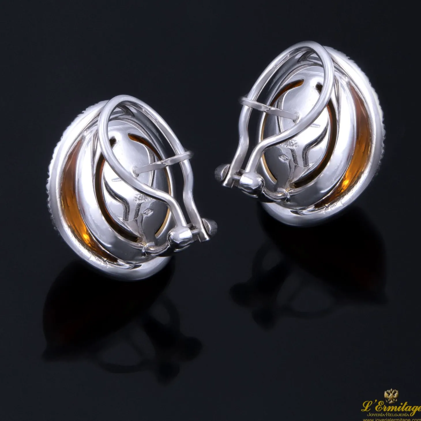PENDIENTES Pendientes oro blanco topacios y diamantes.