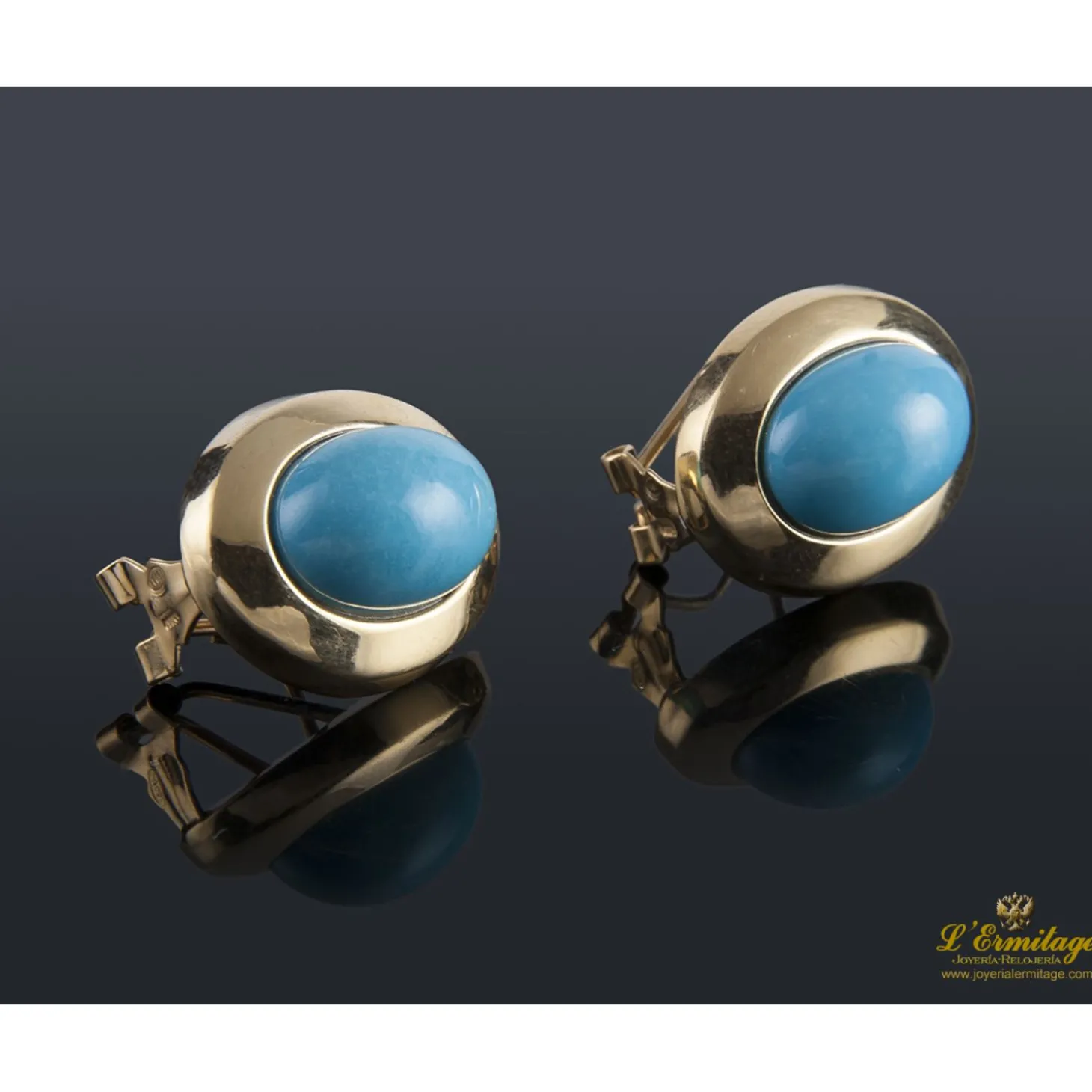 PENDIENTES Pendientes realizados en oro amarillo y turquesas.