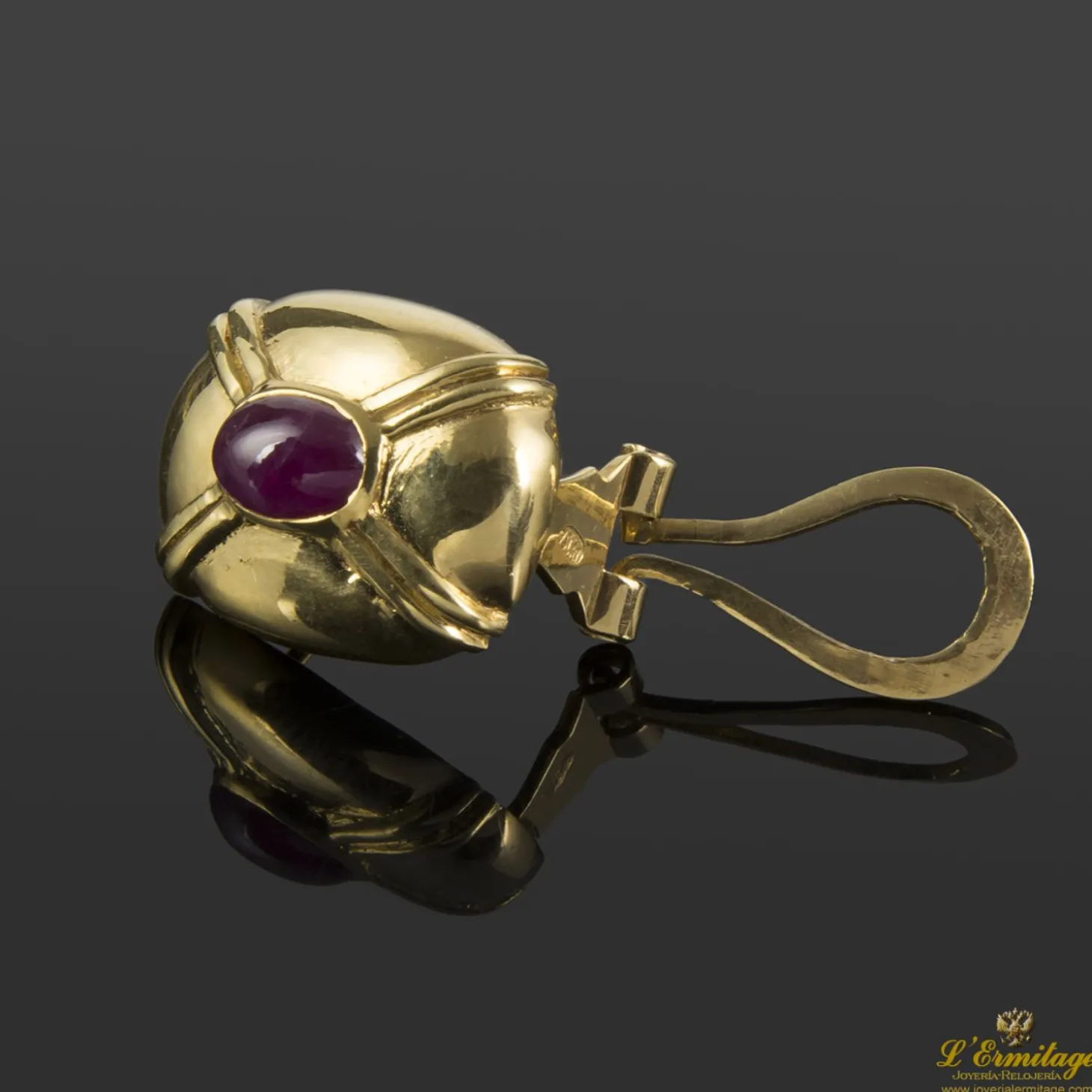 PENDIENTES Pendientes realizados en oro amarillo y rubíes