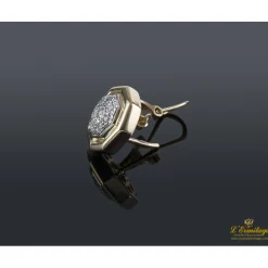 PENDIENTES Pendientes realizados en oro amarillo y brillantes.