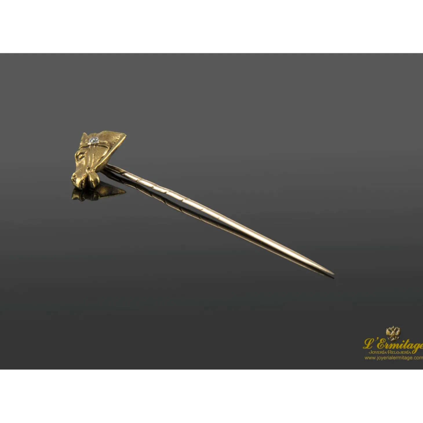 PISACORBATAS Alfiler de corbata realizado en oro amarillo y brillante.