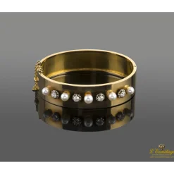 PULSERAS Pulsera antigua rígida oro amarillo perlas y diamantes.