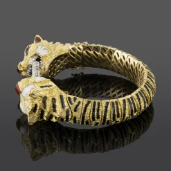 PULSERAS Pulsera articulada semirigida tigres oro amarillo y esmalte.