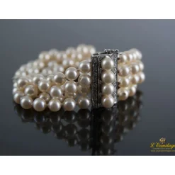 PULSERAS Pulsera cuatro hilos perlas naturales. 18Cm largo.