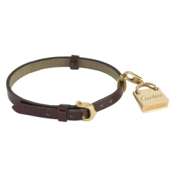 PULSERAS Pulsera cuero cartier con adorno de bolso en oro amarillo