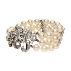PULSERAS Pulsera de perlas con oro blanco y diamantes.