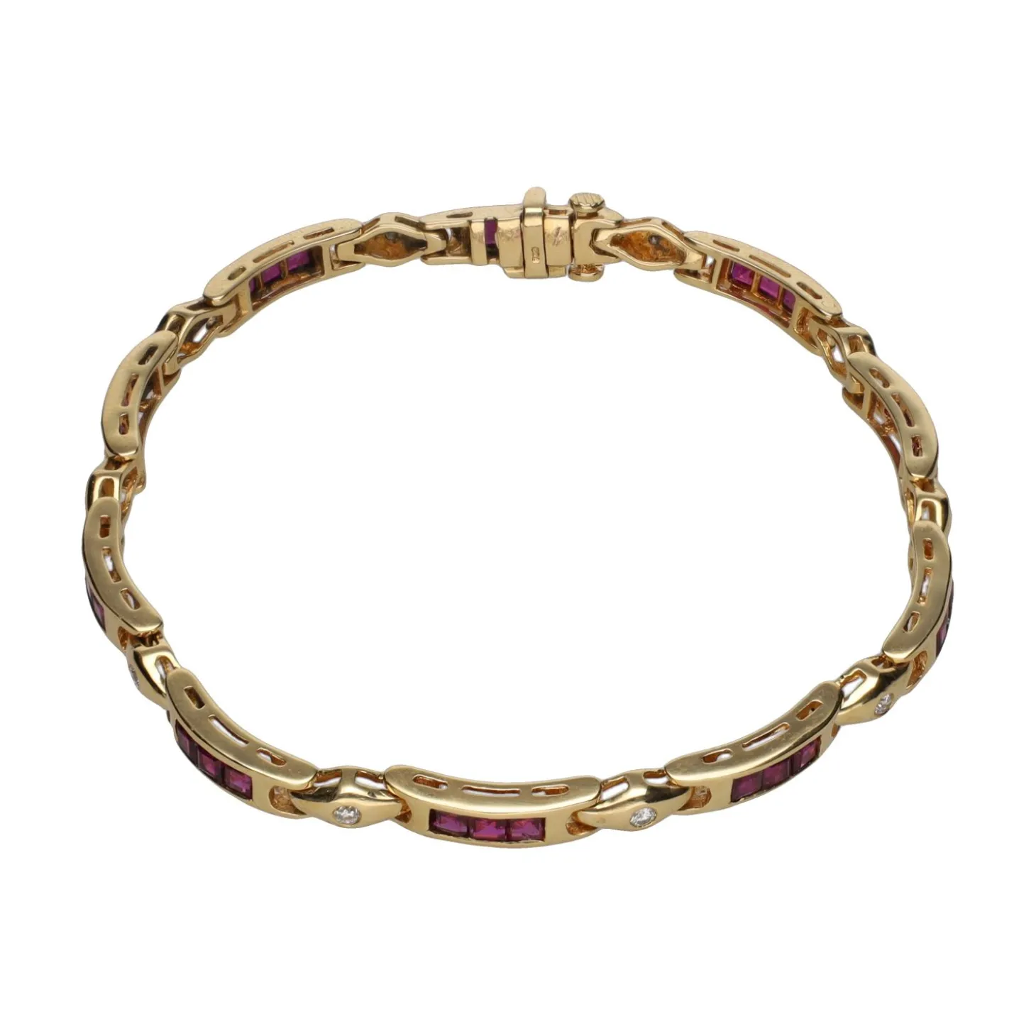 PULSERAS Pulsera en oro amarillo con rubíes y brillantes.