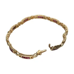 PULSERAS Pulsera en oro amarillo con rubíes y brillantes.