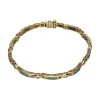 PULSERAS Pulsera en oro amarillo con esmeraldas y brillantes.