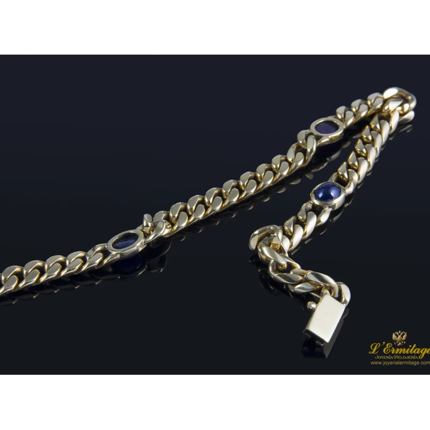 PULSERAS Pulsera en oro amarillo con rubí y zafiros