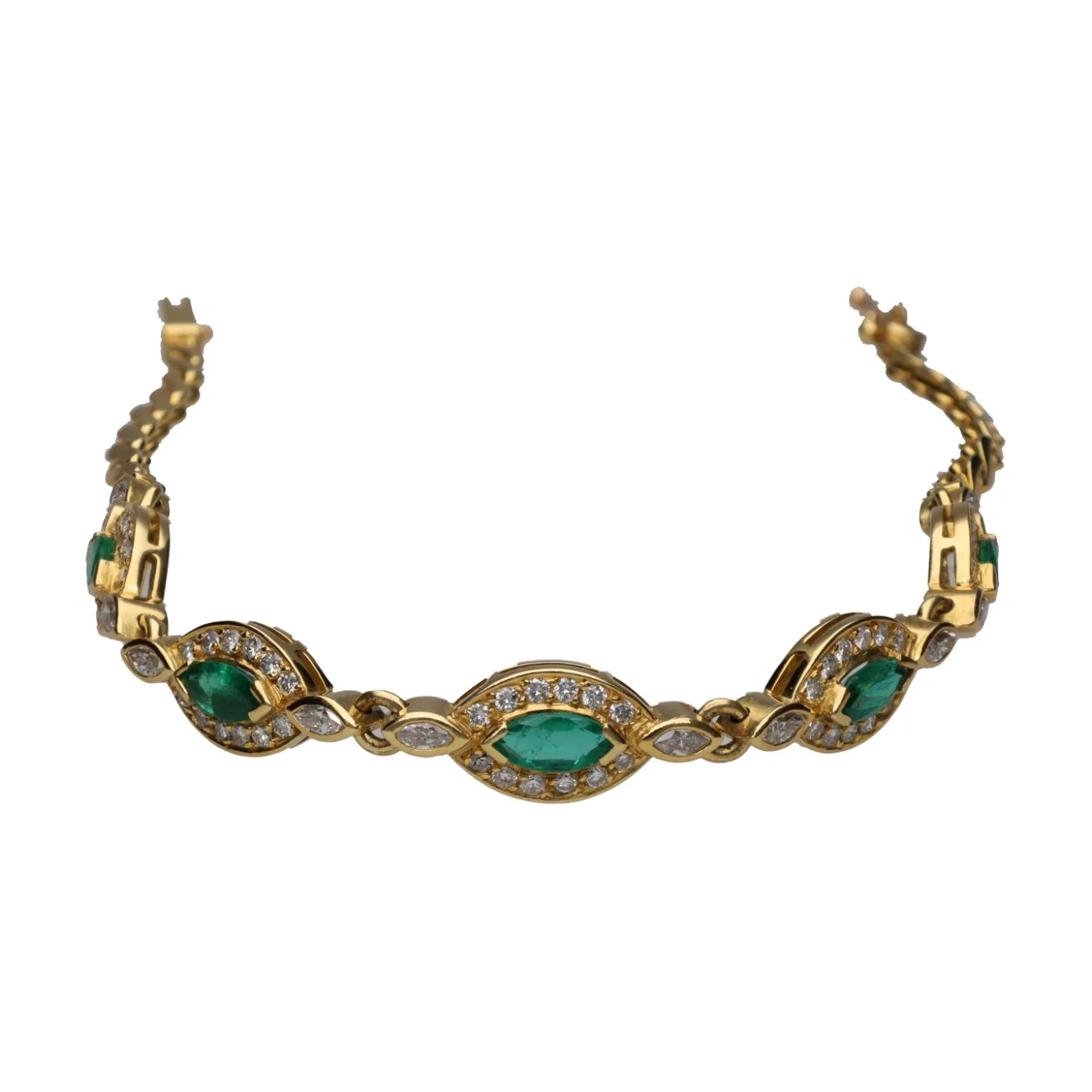PULSERAS Pulsera en oro amarillo con esmeraldas y brillantes.