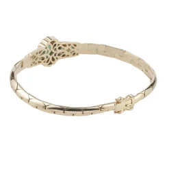 PULSERAS Pulsera en oro amarillo con esmerladas y brillantes.