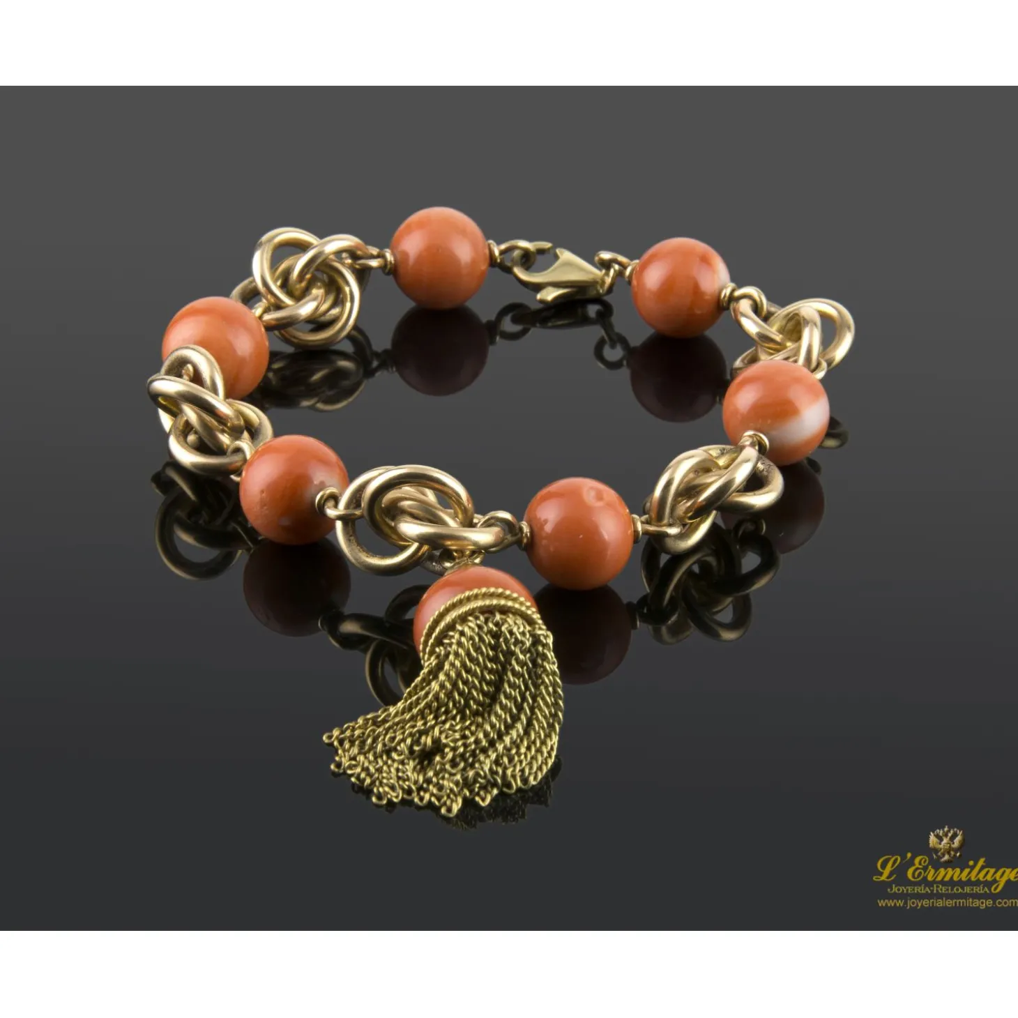PULSERAS Pulsera en oro amarillo con bolas de coral