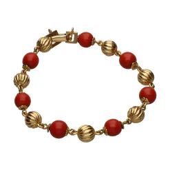 PULSERAS Pulsera en oro amarillo y coral.