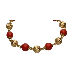 PULSERAS Pulsera en oro amarillo y coral.