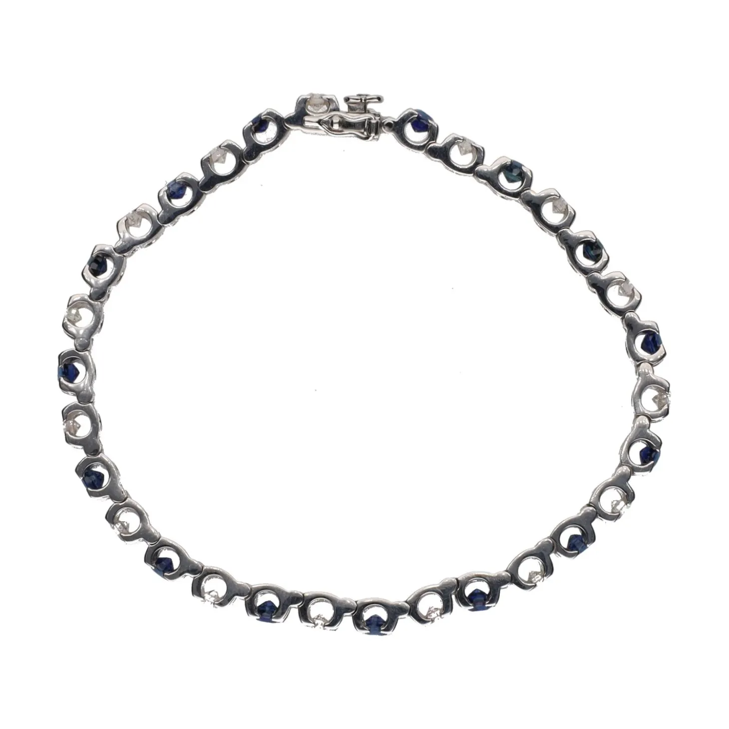 PULSERAS Pulsera en oro blanco con zafiros y brillantes.