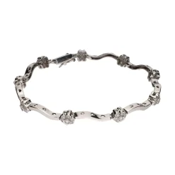 PULSERAS Pulsera en oro blanco y brillantes.