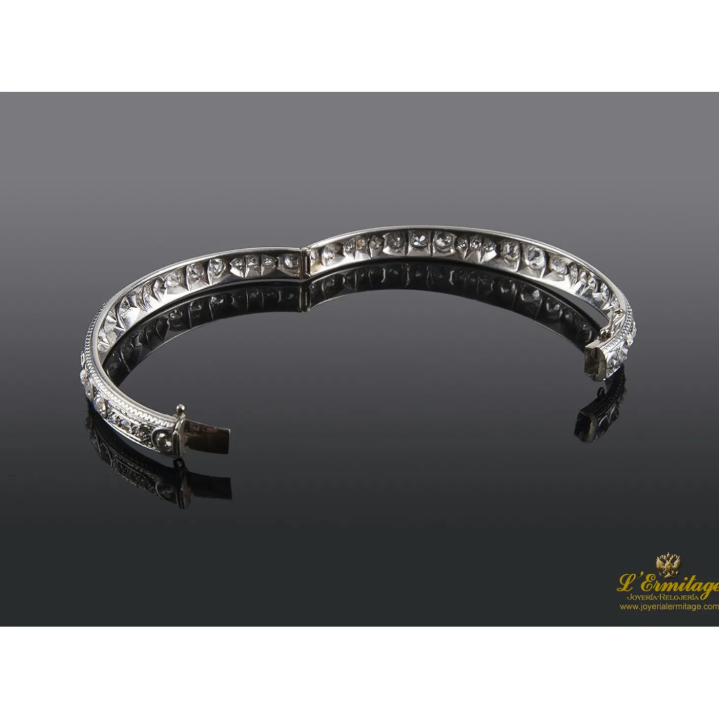 PULSERAS Pulsera platino de media caña y diamantes talla antigua