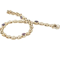 PULSERAS Pulsera realizada en oro amarillo con rubíes.