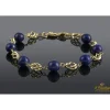 PULSERAS Pulsera realizada en oro amarillo con bolas de lapislázulis.