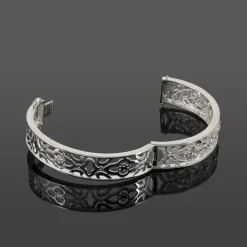 PULSERAS Pulsera rígida calada oro blanco y diamantes