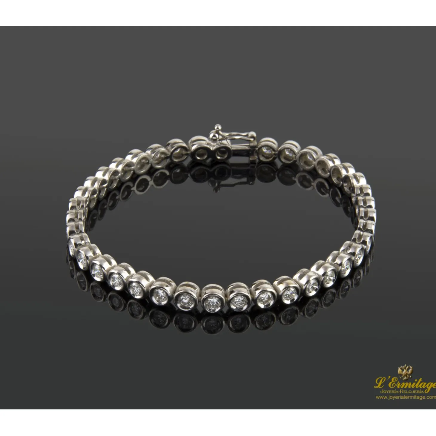 PULSERAS Pulsera riviere chatones oro blanco brillantes.
