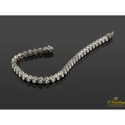PULSERAS Pulsera riviere chatones oro blanco brillantes.