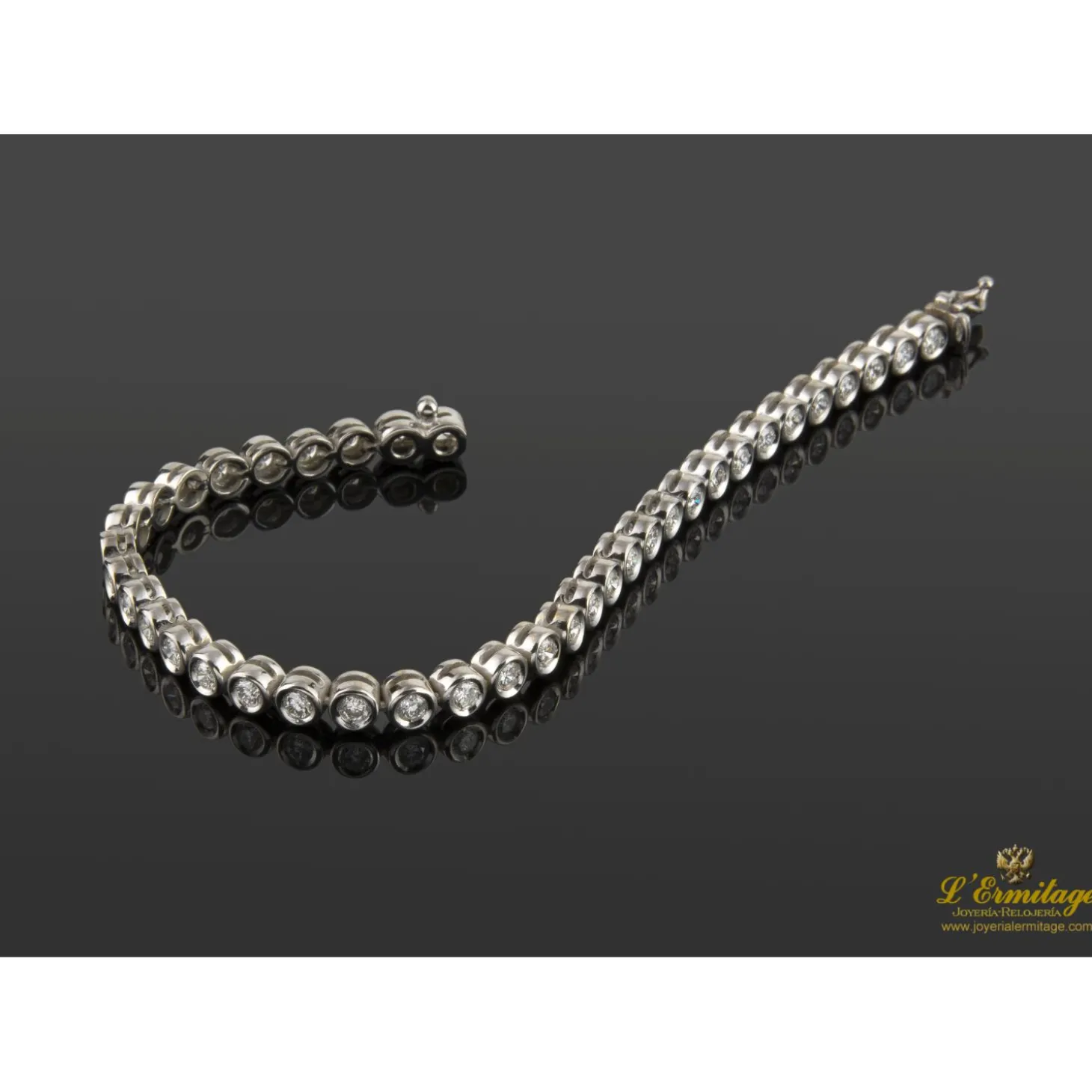 PULSERAS Pulsera riviere chatones oro blanco brillantes.