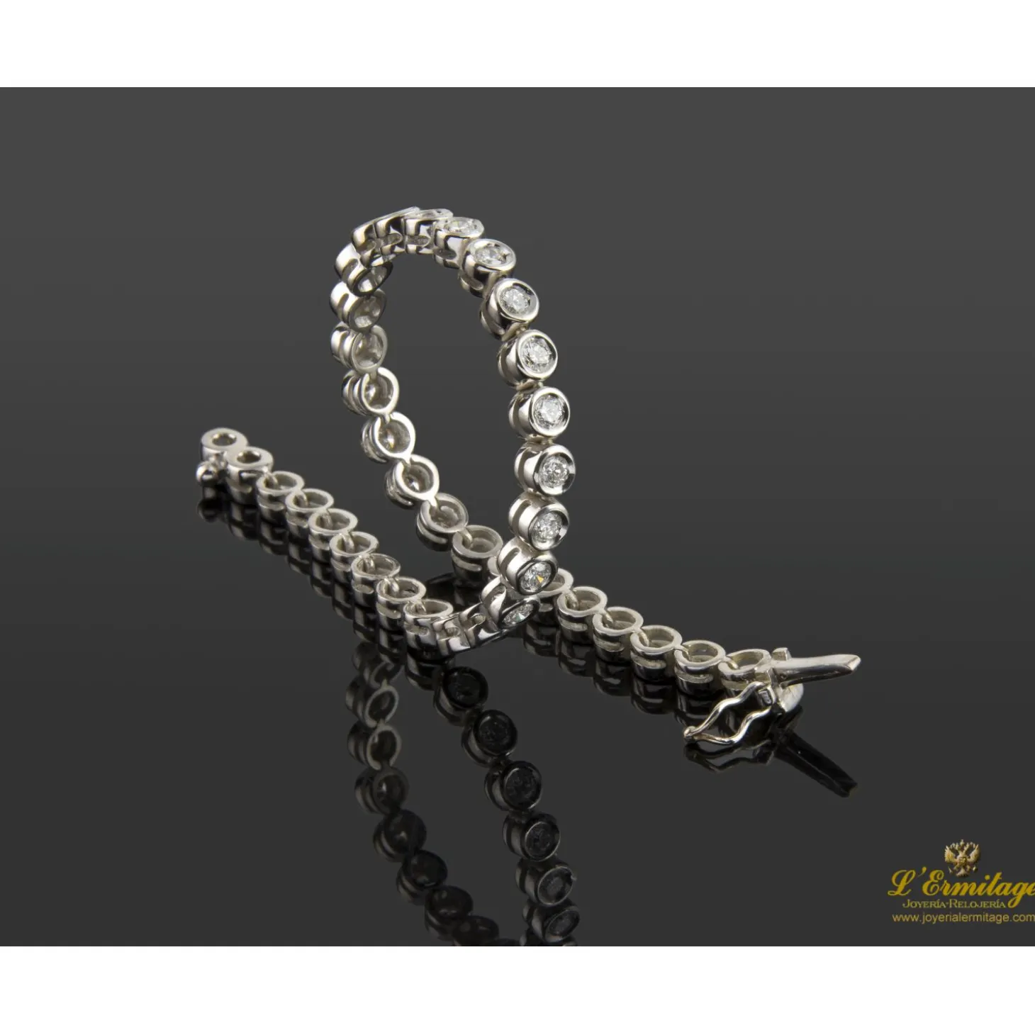 PULSERAS Pulsera riviere chatones oro blanco brillantes.